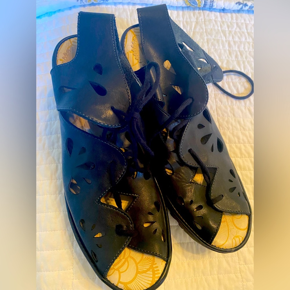 Fly London wedge lace ups. Never worn! Sz: 41